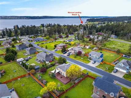 a view of a lake with a big yard