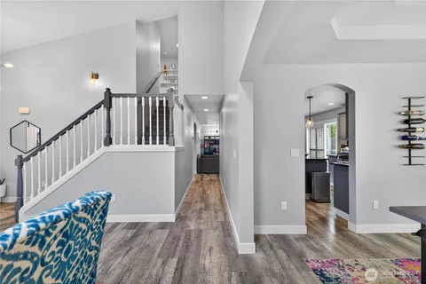 a view of entryway with wooden floor