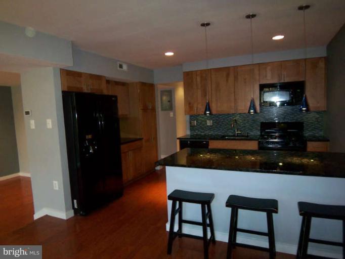 1663 Parkcrest Circle, Unit 5B/100 Reston, VA 20190 - Photo 1 of 26 Kitchen