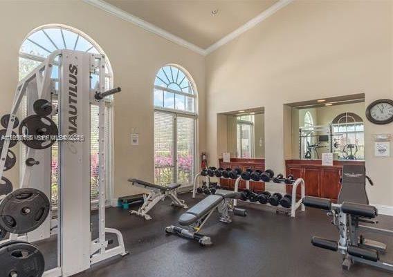 1398 Northeast 33rd Avenue, Unit 10825 Homestead, FL 33033 - Photo 6 of 8 a view of a livingroom with furniture and a large window