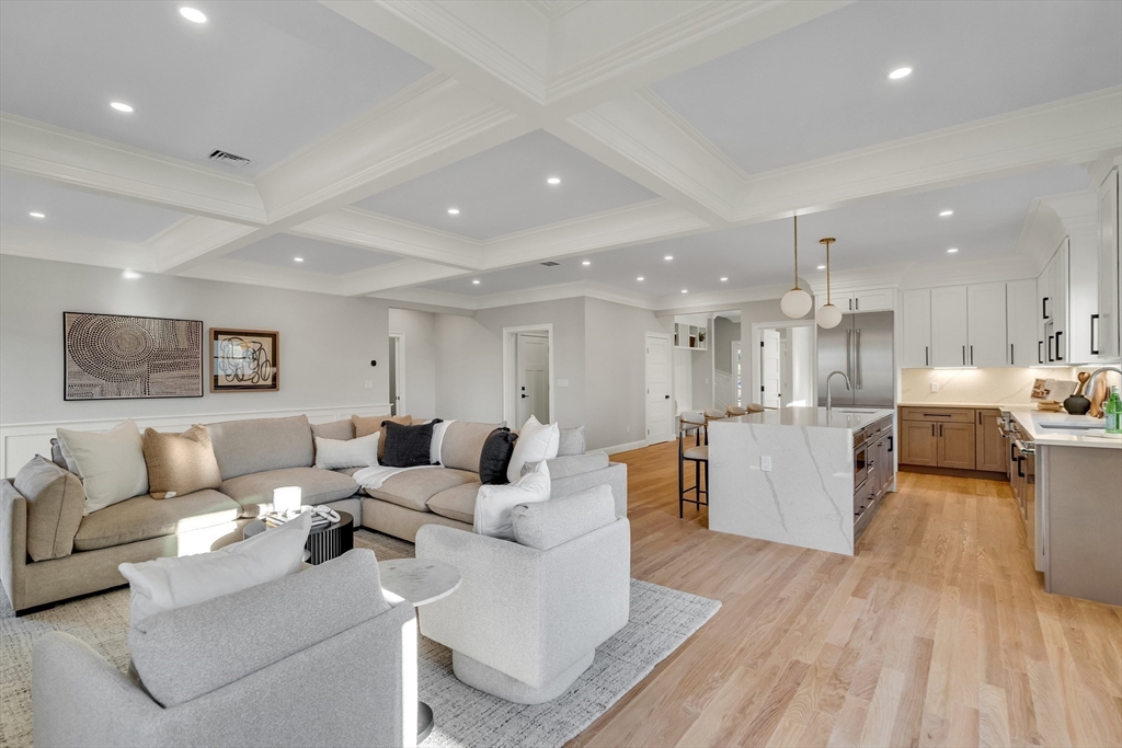 24 Deering Avenue Lexington, MA 02421 - Photo 14 of 42 a living room with furniture and a wooden floor
