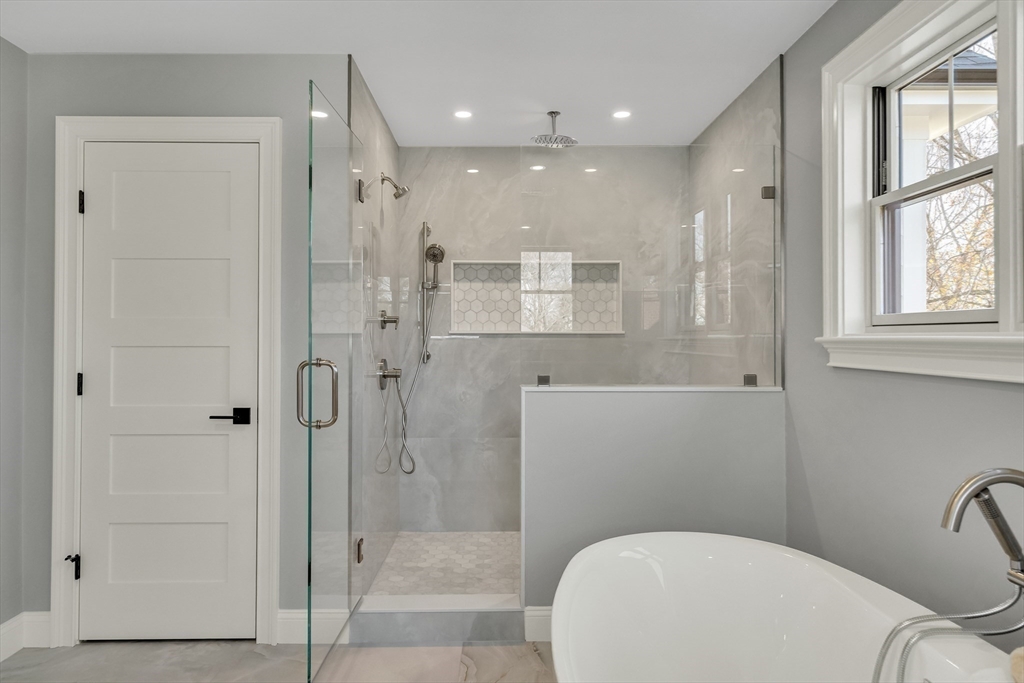 24 Deering Avenue Lexington, MA 02421 - Photo 21 of 42 a bathroom with a toilet a sink and shower