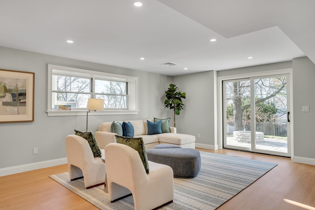 24 Deering Avenue Lexington, MA 02421 - Photo 34 of 42 a living room with furniture and wooden floor