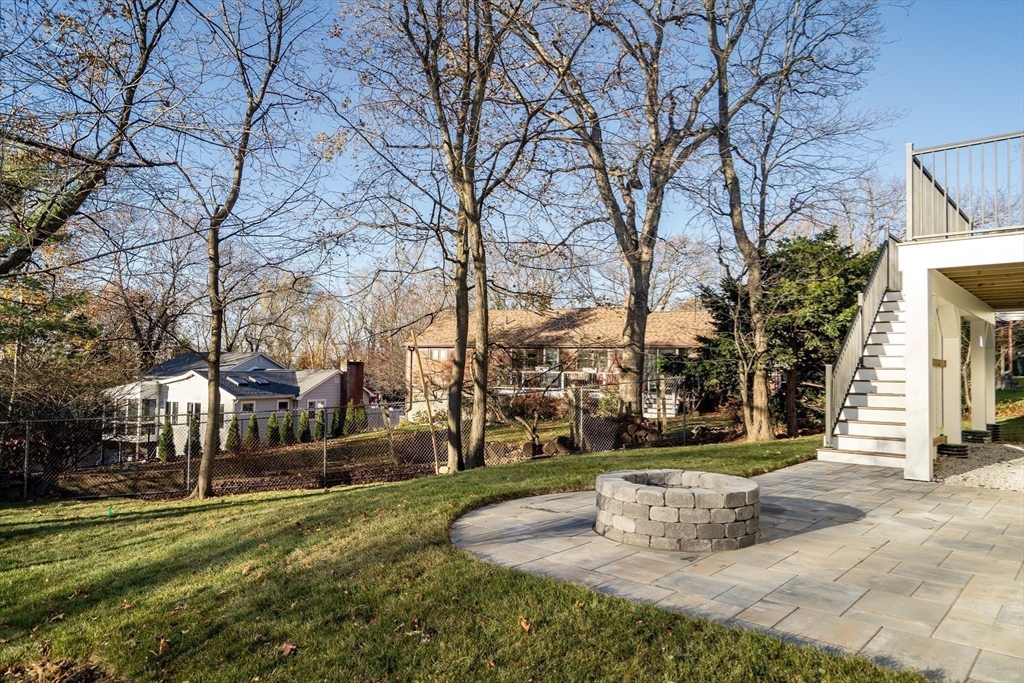 24 Deering Avenue Lexington, MA 02421 - Photo 36 of 42 a view of a fountain in front of a house