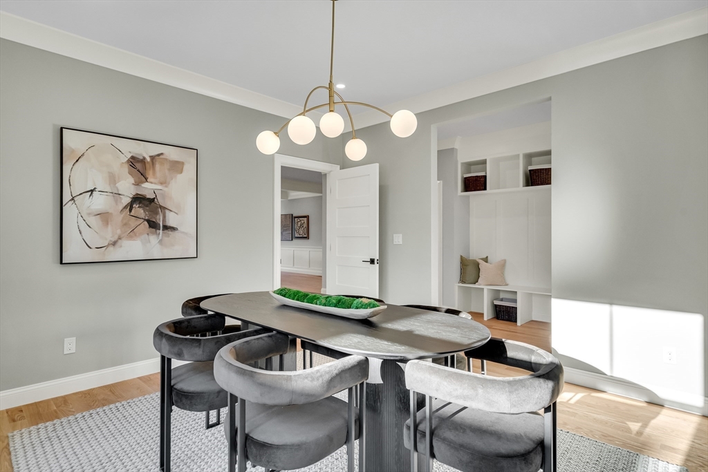 24 Deering Avenue Lexington, MA 02421 - Photo 6 of 42 a view of a dining room with furniture and wooden floor