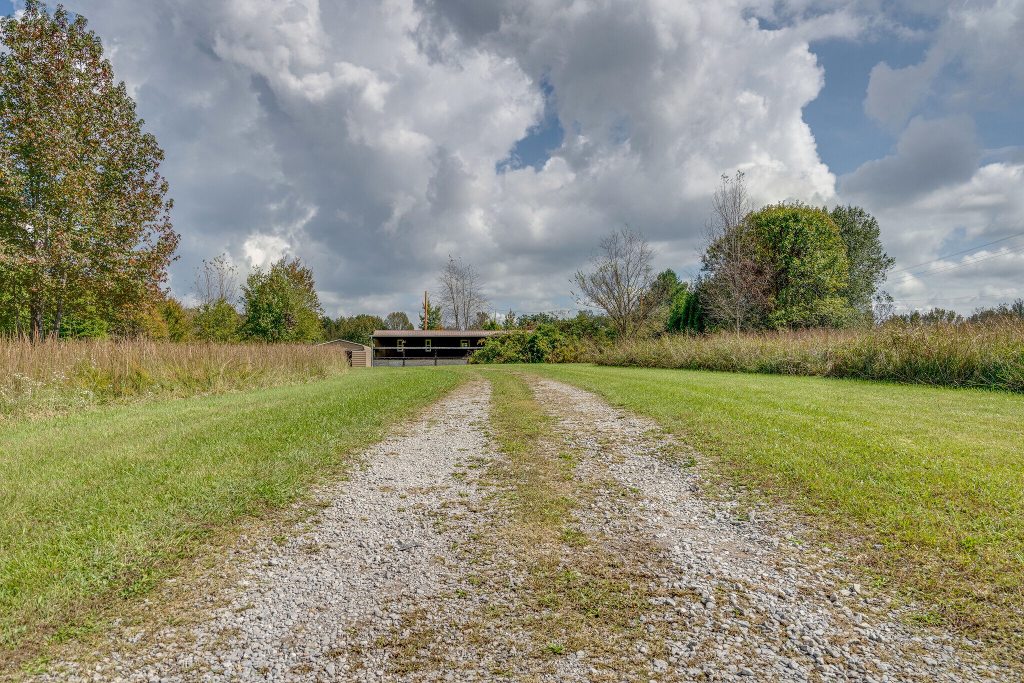 2031 Sugar Camp Road Springfield, TN 37172 - Photo 17 of 42 a view of a lake with houses in the back