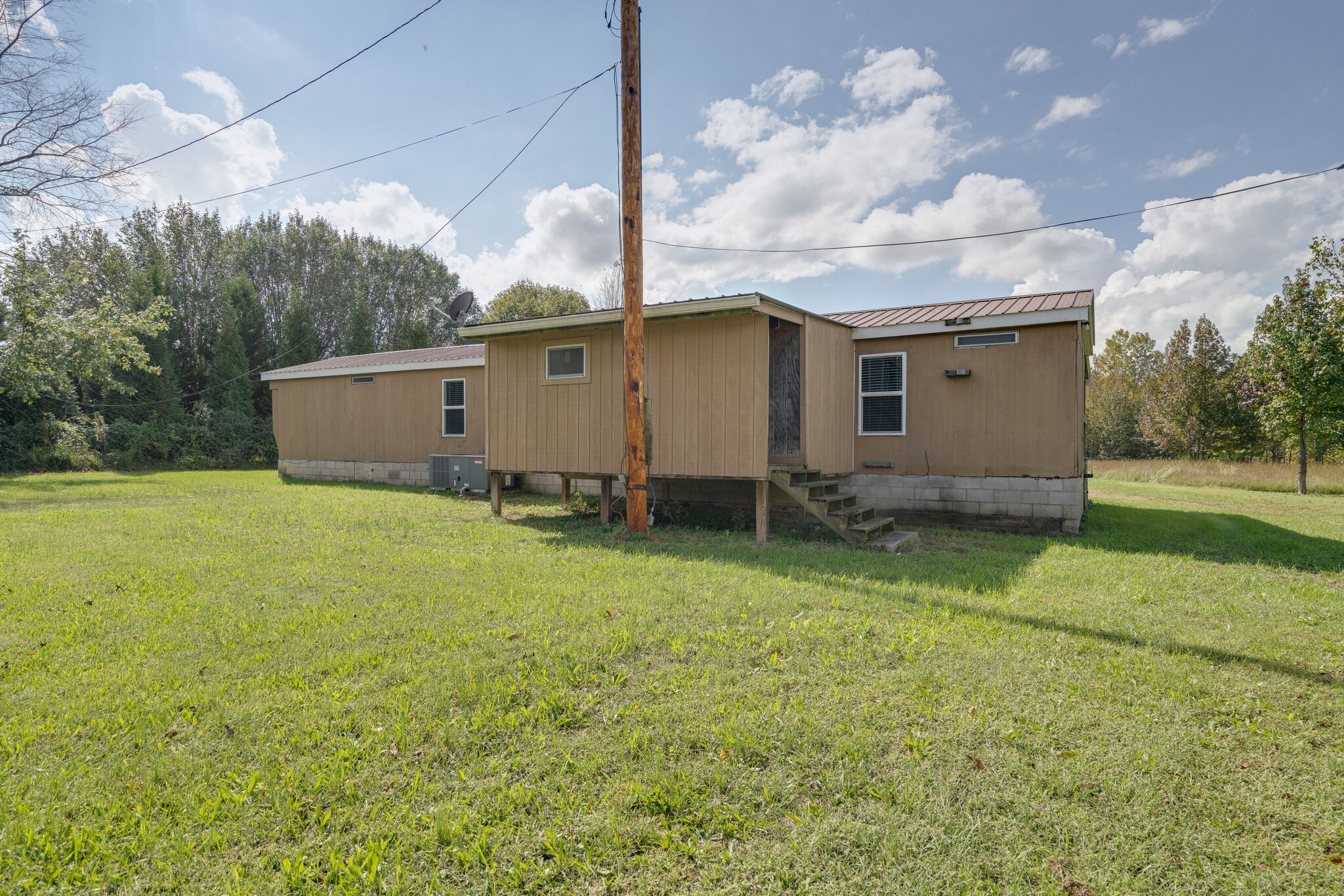2031 Sugar Camp Road Springfield, TN 37172 - Photo 19 of 42 a backyard of a house with lots of green space