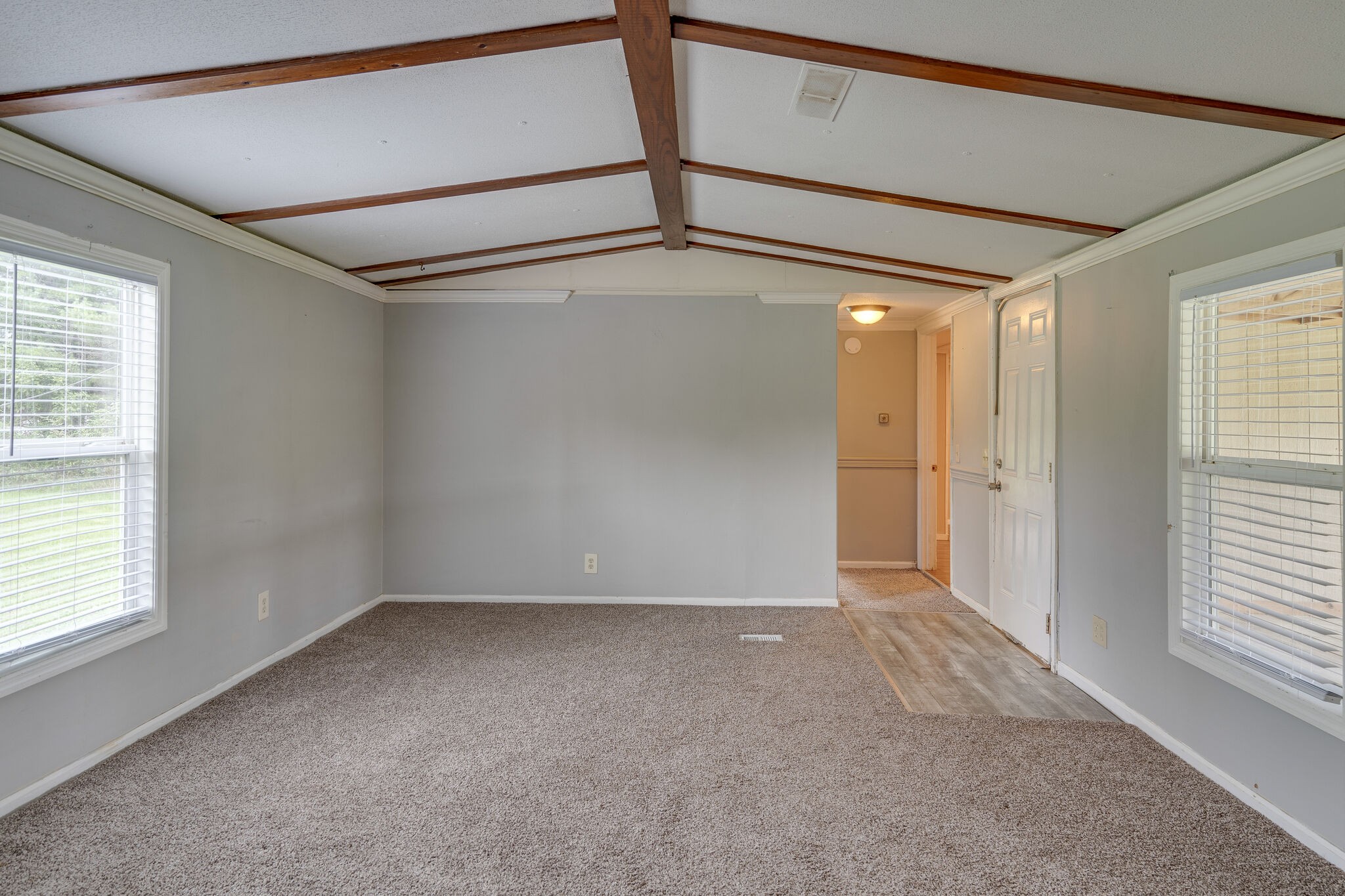 2031 Sugar Camp Road Springfield, TN 37172 - Photo 27 of 42 an empty room with windows and entrance