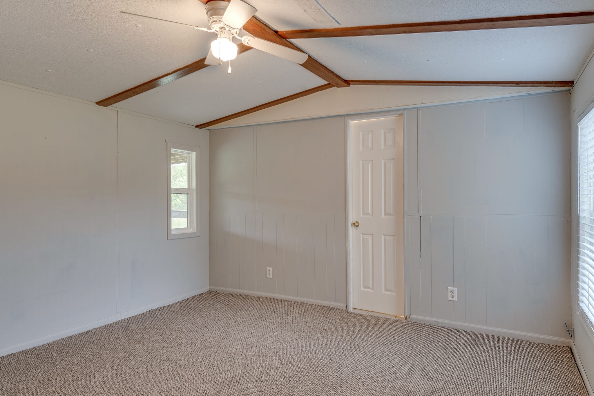 2031 Sugar Camp Road Springfield, TN 37172 - Photo 30 of 42 an empty room with windows and fan