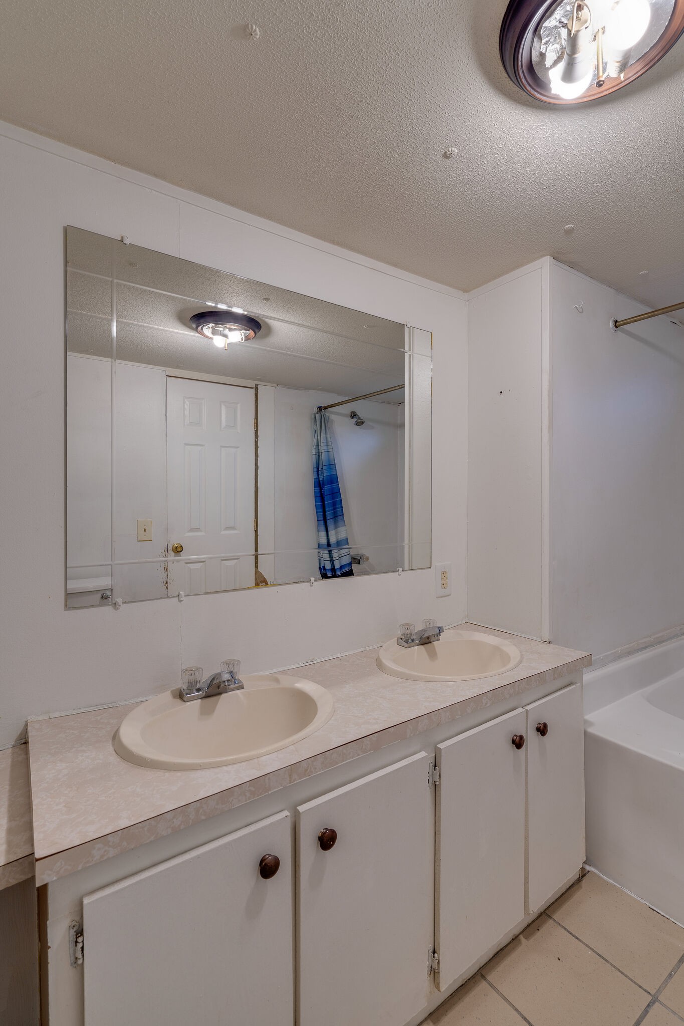 2031 Sugar Camp Road Springfield, TN 37172 - Photo 34 of 42 a bathroom with a sink and a mirror