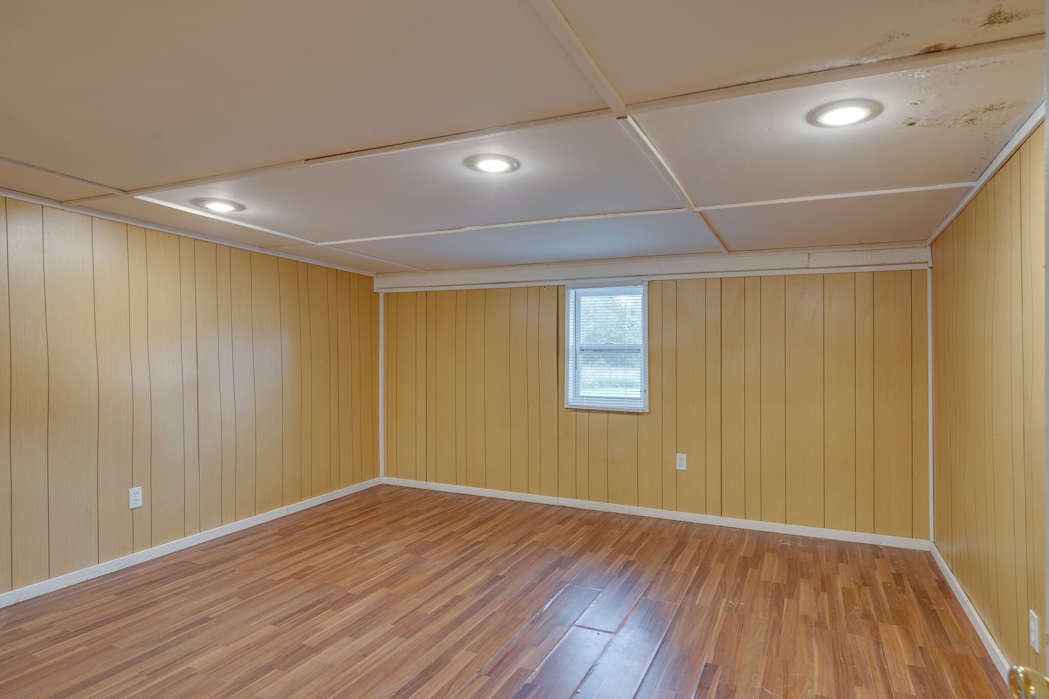 2031 Sugar Camp Road Springfield, TN 37172 - Photo 39 of 42 a view of an empty room with wooden floor and a window
