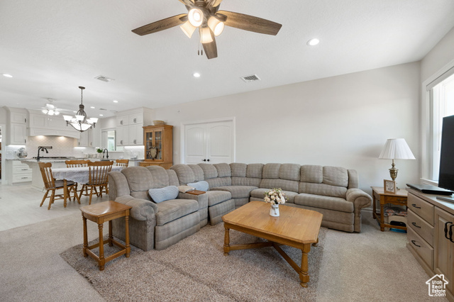 230 Boulder Way Leeds, UT 84746 - Photo 13 of 72 Main Family room area with a ceiling fan, recessed lighting, and light carpet