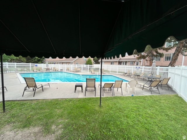 6884 670 East Midvale, UT 84047 - Photo 21 of 28 Community pool with a patio area