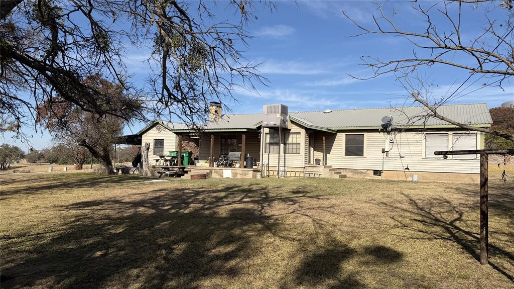 5 W Highway Goldthwaite, TX 76844 - Photo 11 of 29 a front view of a house with a yard