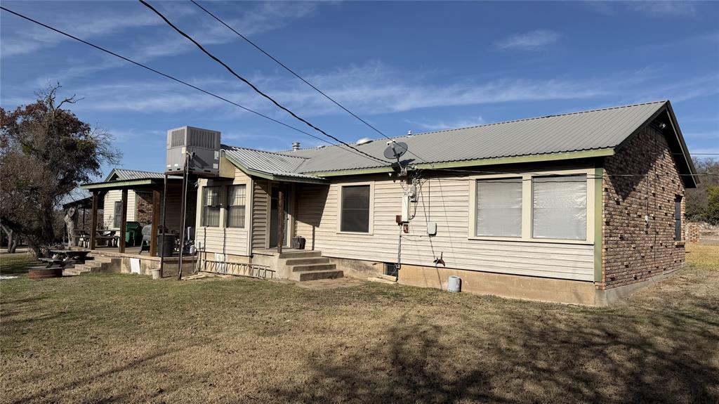 5 W Highway Goldthwaite, TX 76844 - Photo 12 of 29 a front view of a house with a yard