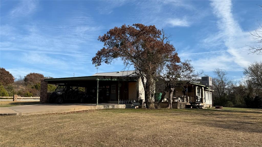 5 W Highway Goldthwaite, TX 76844 - Photo 14 of 29 a front view of a building with a garden