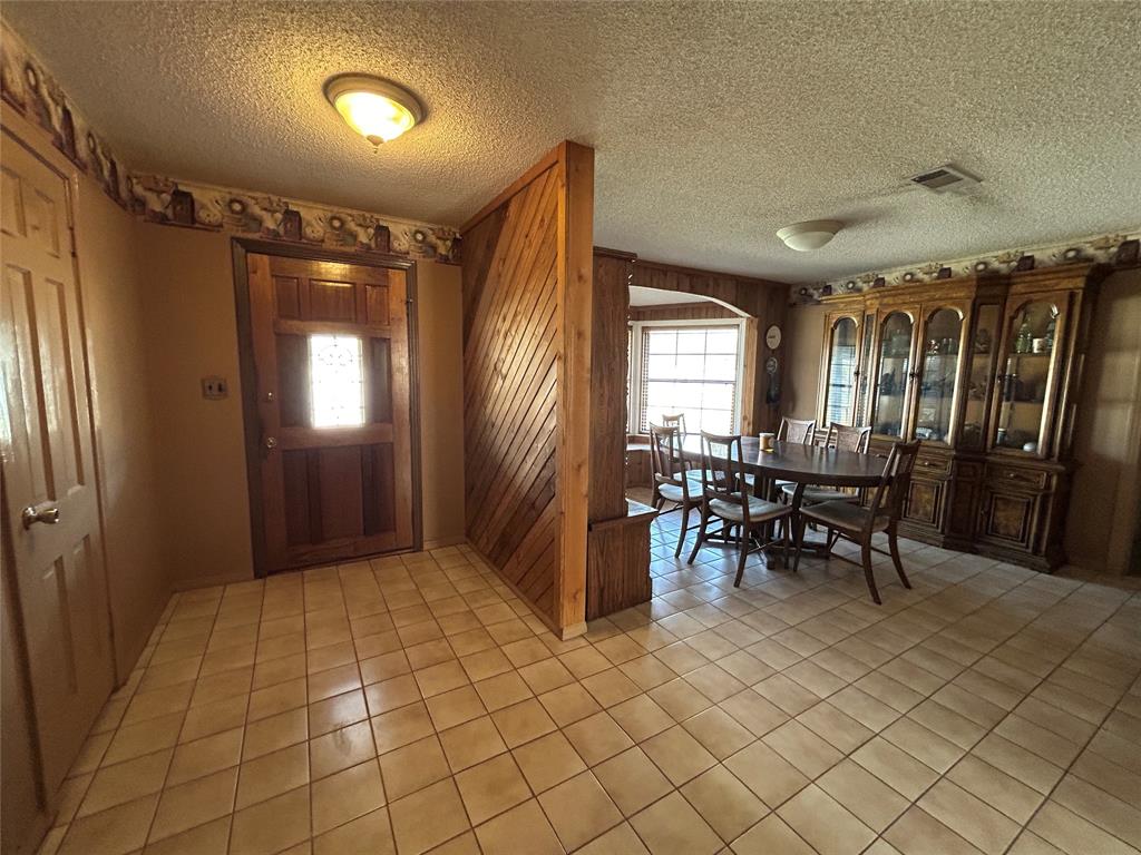 5 W Highway Goldthwaite, TX 76844 - Photo 19 of 29 a view of a dining room with furniture window and wooden floor