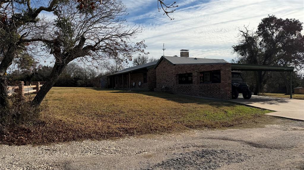 5 W Highway Goldthwaite, TX 76844 - Photo 7 of 29 a front view of a house with a yard