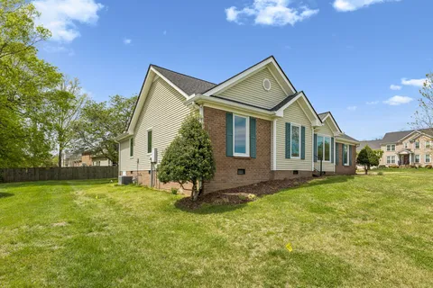 a view of balcony with wooden floor and stairs