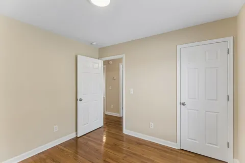 a view of a house with a yard and garage