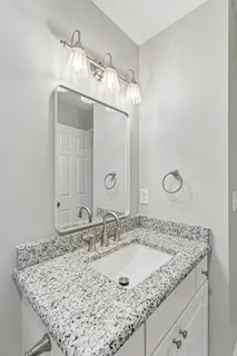 a view of a park with large trees