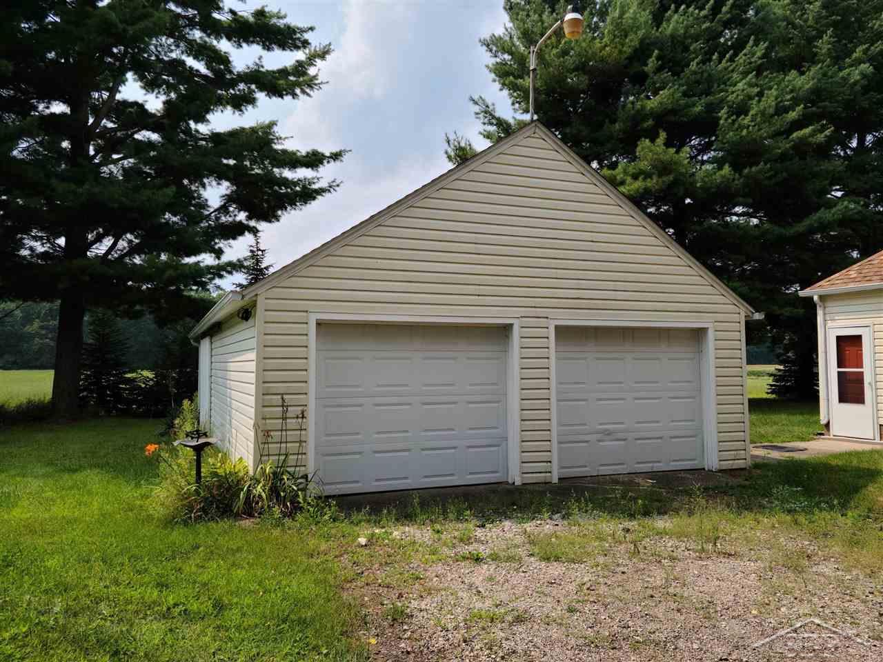 13710 Litchfield Road Montrose, MI 48457 - Photo 3 of 20 Extra storage in back