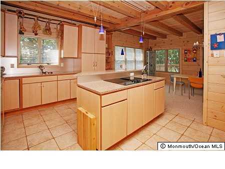 53 Sunnyside Road Howell, NJ 07731 - Photo 3 of 3 a kitchen with a sink and a stove top oven