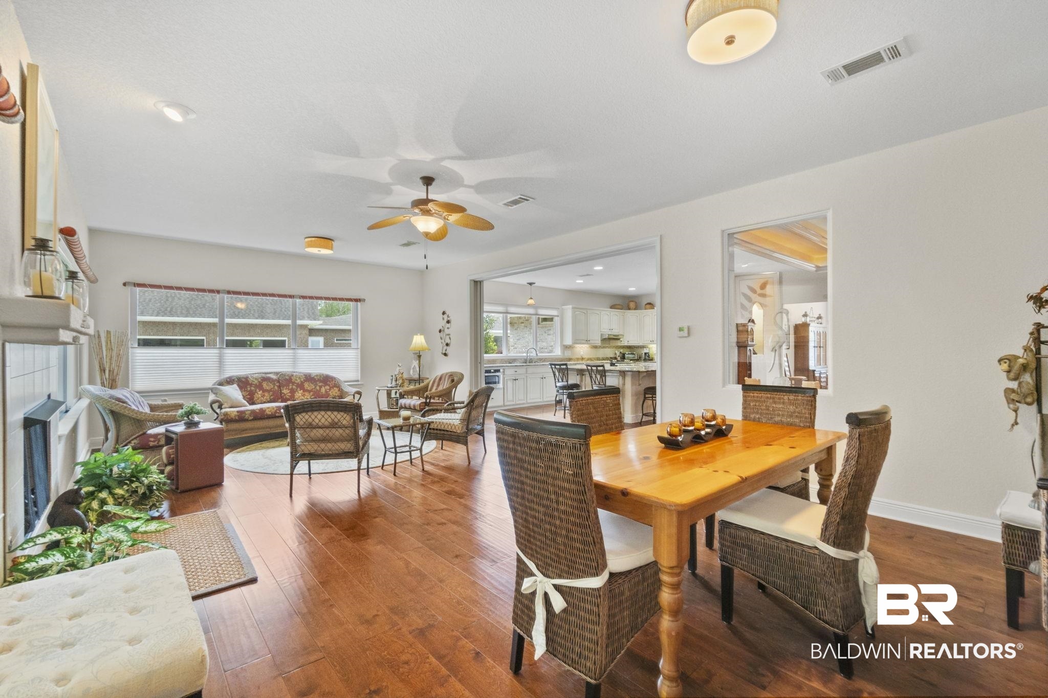 8664 Foxtail Loop Pensacola, FL 32526 - Photo 16 of 64 Dining room with wood finished floors, ceiling fan, and baseboards