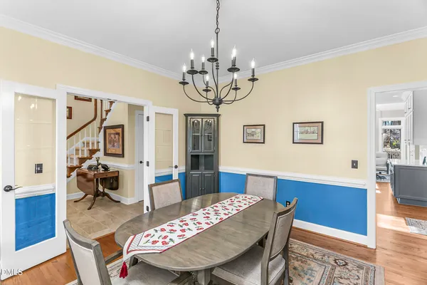 a bathroom with a sink mirror and toilet