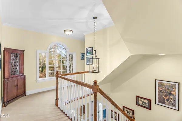 a spacious bathroom with a double vanity sink and a mirror