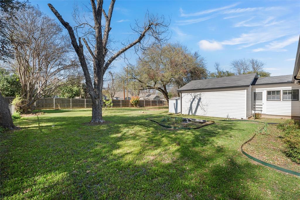 3117 Colcord Avenue Waco, TX 76707 - Photo 18 of 26 a view of a house with a backyard
