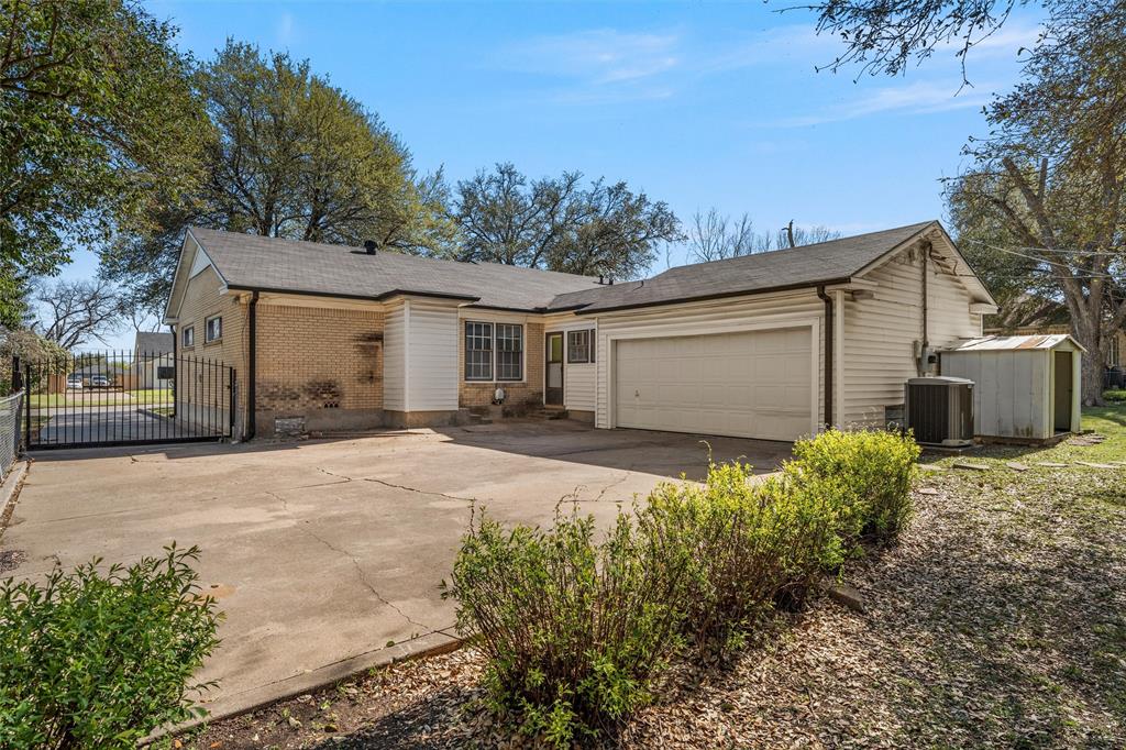 3117 Colcord Avenue Waco, TX 76707 - Photo 19 of 26 a front view of a house with garden