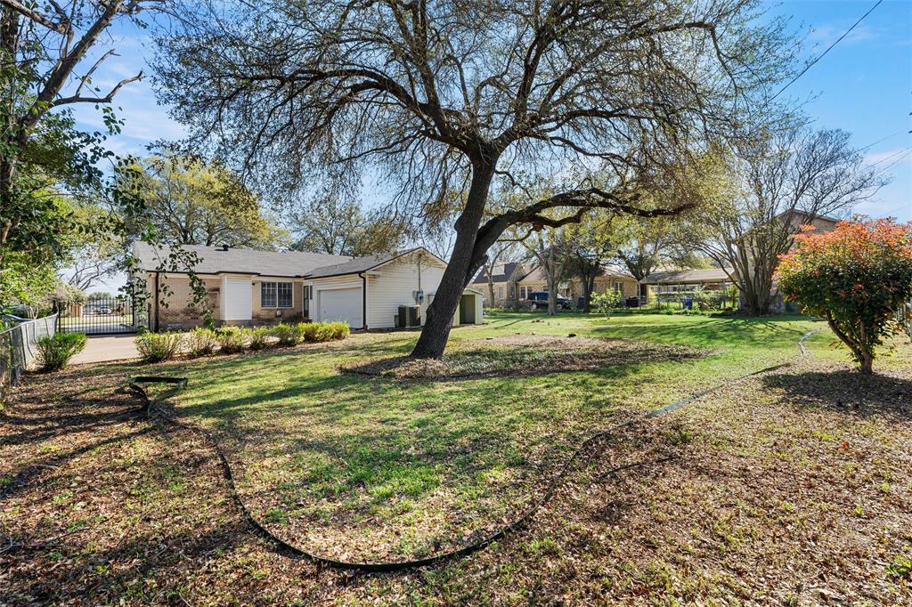 3117 Colcord Avenue Waco, TX 76707 - Photo 20 of 26 a view of a house with a yard