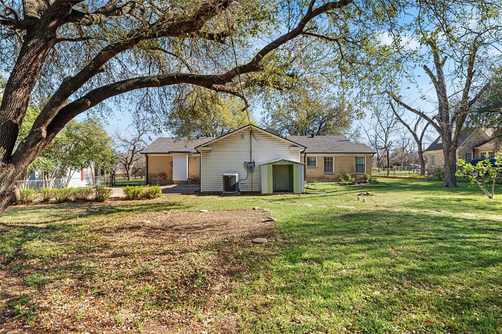 3117 Colcord Avenue Waco, TX 76707 - Photo 21 of 26 a view of a house with a yard