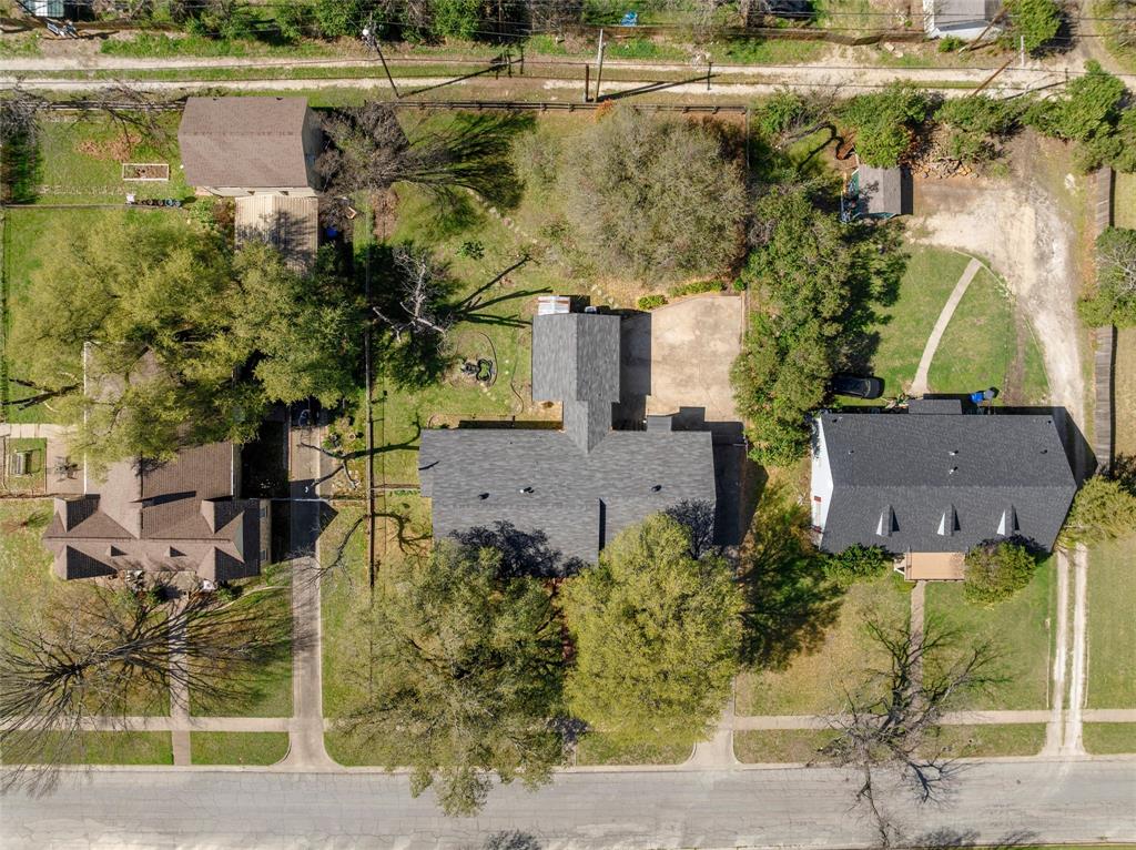 3117 Colcord Avenue Waco, TX 76707 - Photo 25 of 26 an aerial view of a house with a lake view