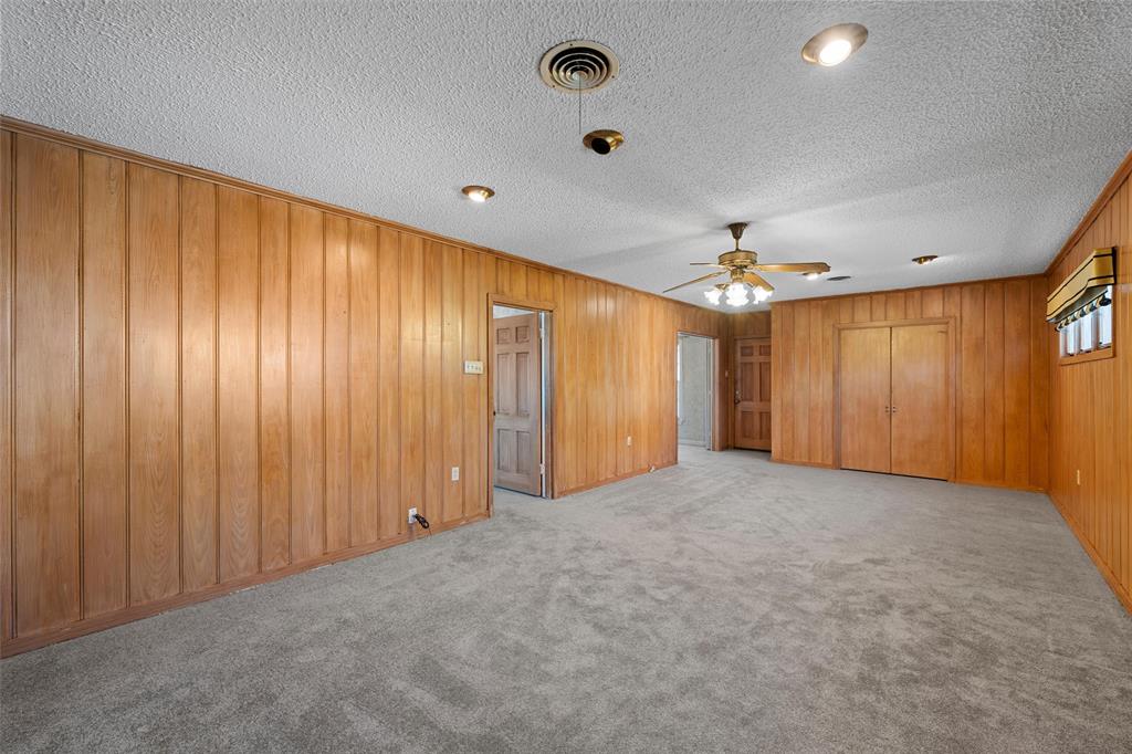 3117 Colcord Avenue Waco, TX 76707 - Photo 10 of 26 wooden floor in an empty room with a window