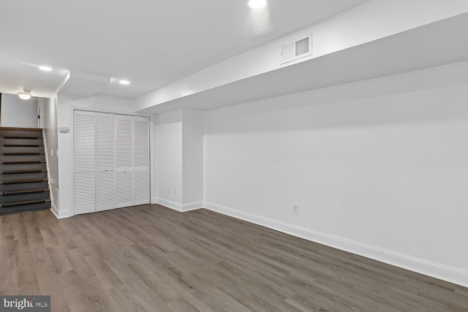 15764 Beau Ridge Drive Woodbridge, VA 22193 - Photo 35 of 58 a view of an empty room with wooden floor
