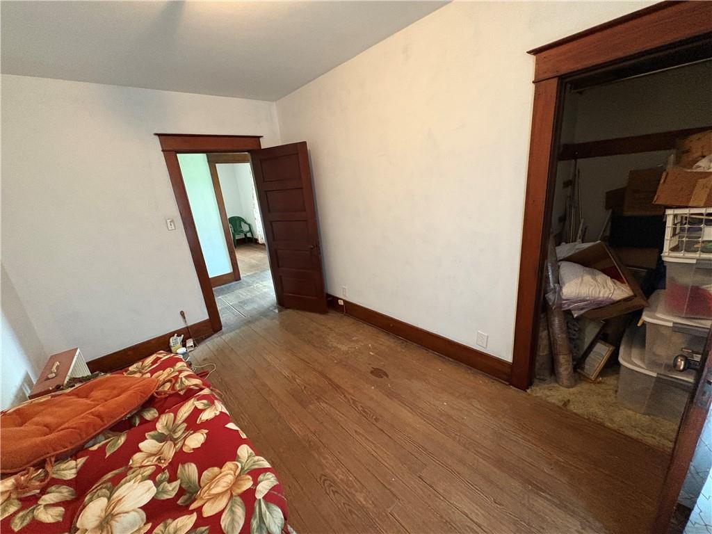 4561 Rte 210 Highway Smicksburg, PA 16256 - Photo 23 of 32 a bedroom with a bed and a mirror