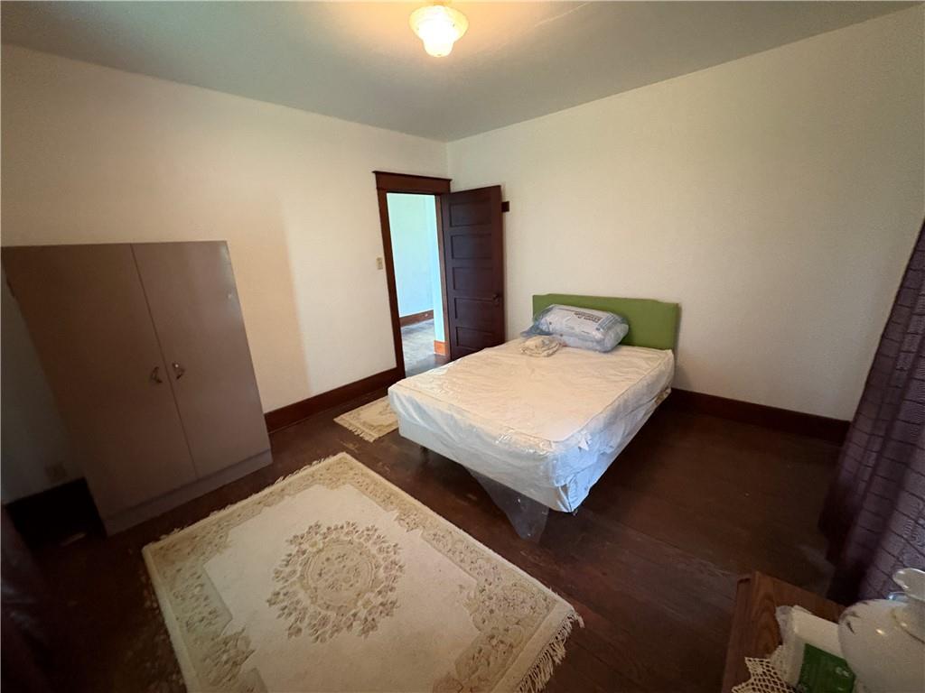 4561 Rte 210 Highway Smicksburg, PA 16256 - Photo 26 of 32 a bedroom with a bed and wooden floor