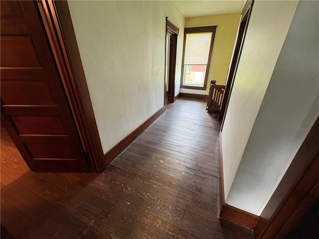 4561 Rte 210 Highway Smicksburg, PA 16256 - Photo 28 of 32 a view of a hallway view with wooden floor and staircase