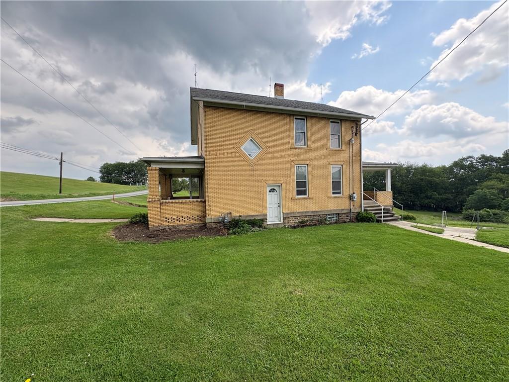4561 Rte 210 Highway Smicksburg, PA 16256 - Photo 3 of 32 a view of a back yard of the house with green space