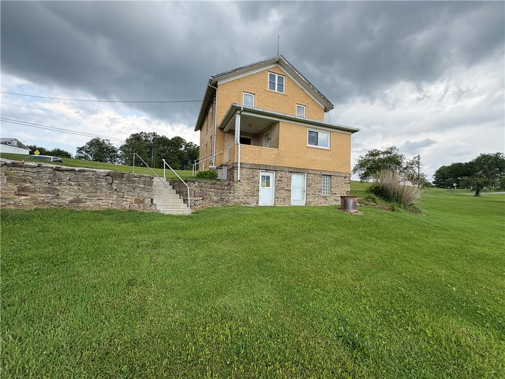 4561 Rte 210 Highway Smicksburg, PA 16256 - Photo 5 of 32 a front view of house with garden