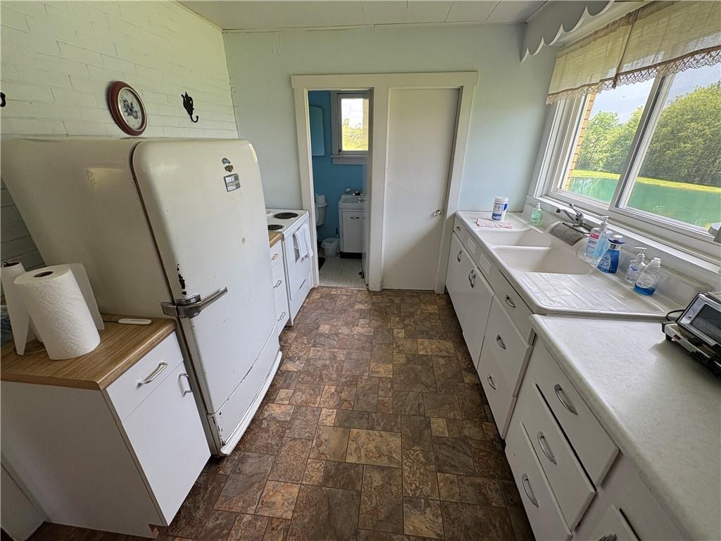 4561 Rte 210 Highway Smicksburg, PA 16256 - Photo 9 of 32 a view of a bathroom with sink and mirror