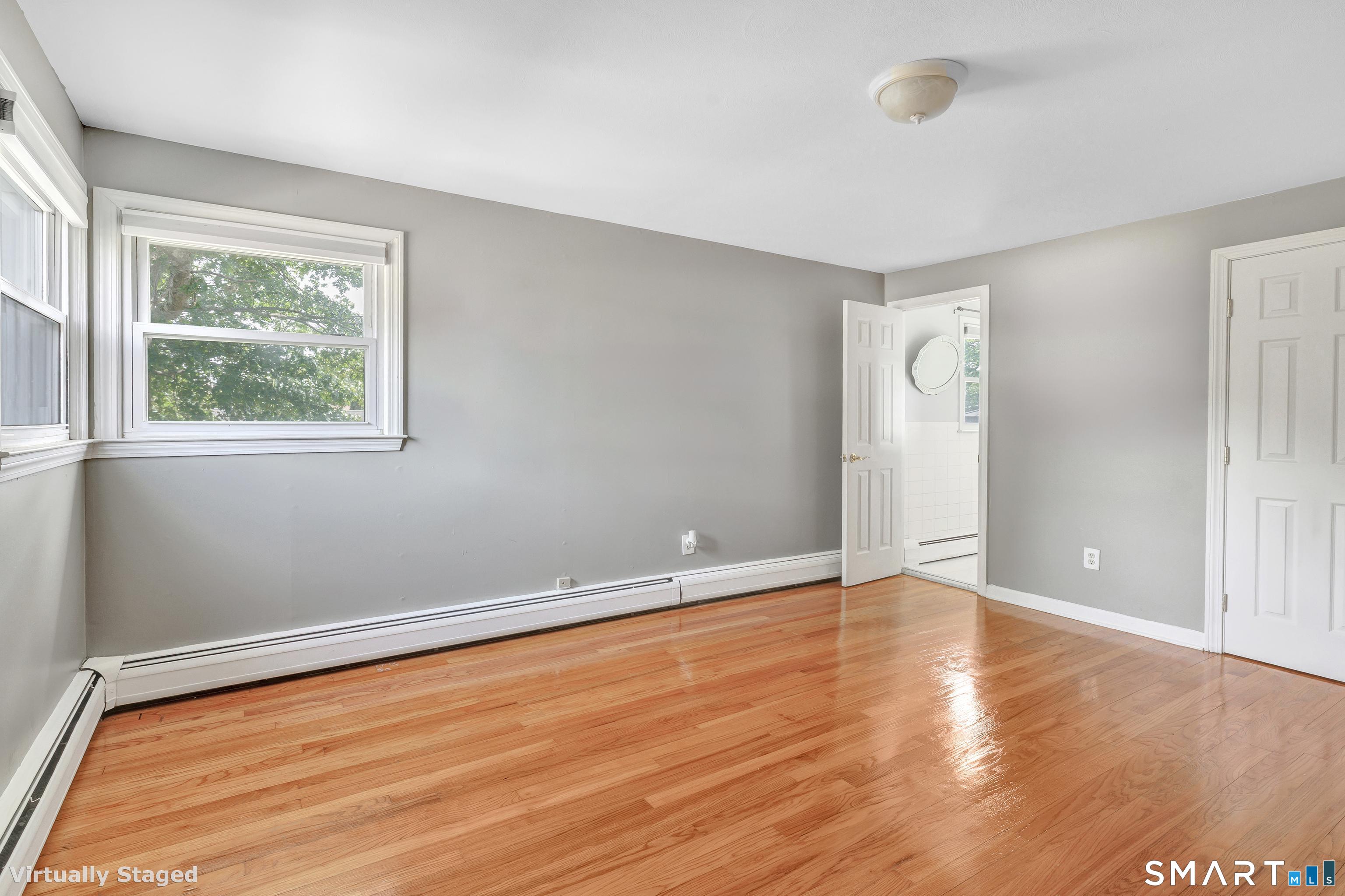 175 Post Oak Road Stratford, CT 06614 - Photo 19 of 33 MASTER BEDROOM AND HALF BATH