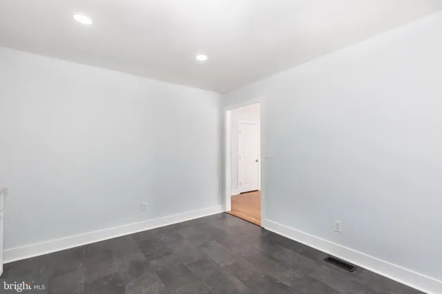 an empty room with an entryway