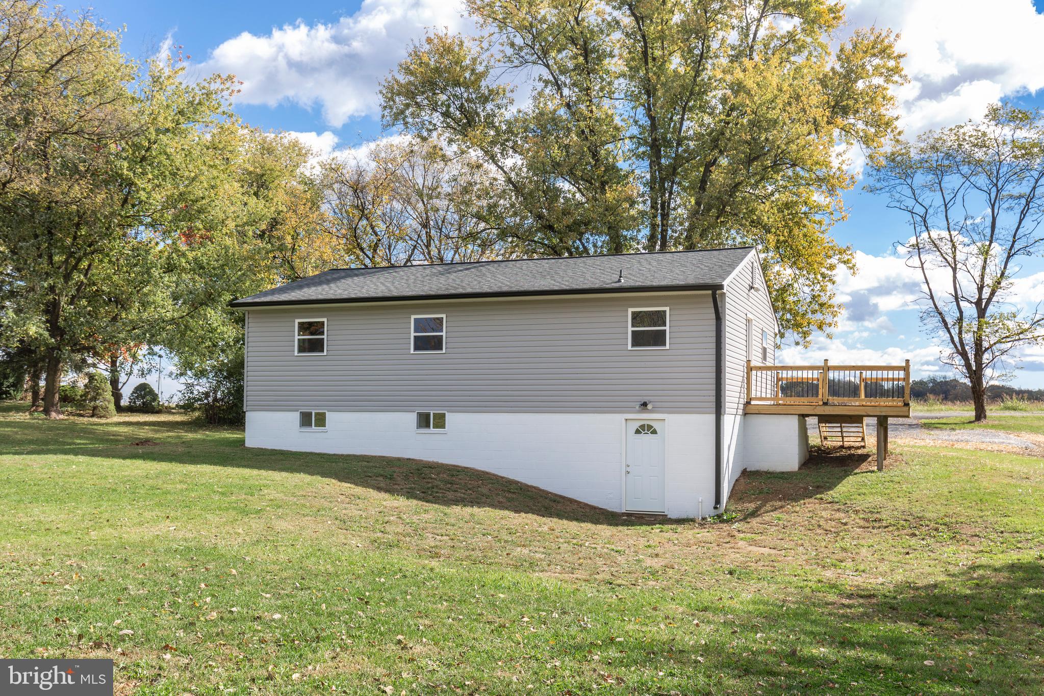 1030 Mckinstrys Mill Road Union Bridge, MD 21791 - Photo 28 of 43 a view of a backyard with a garden and tree