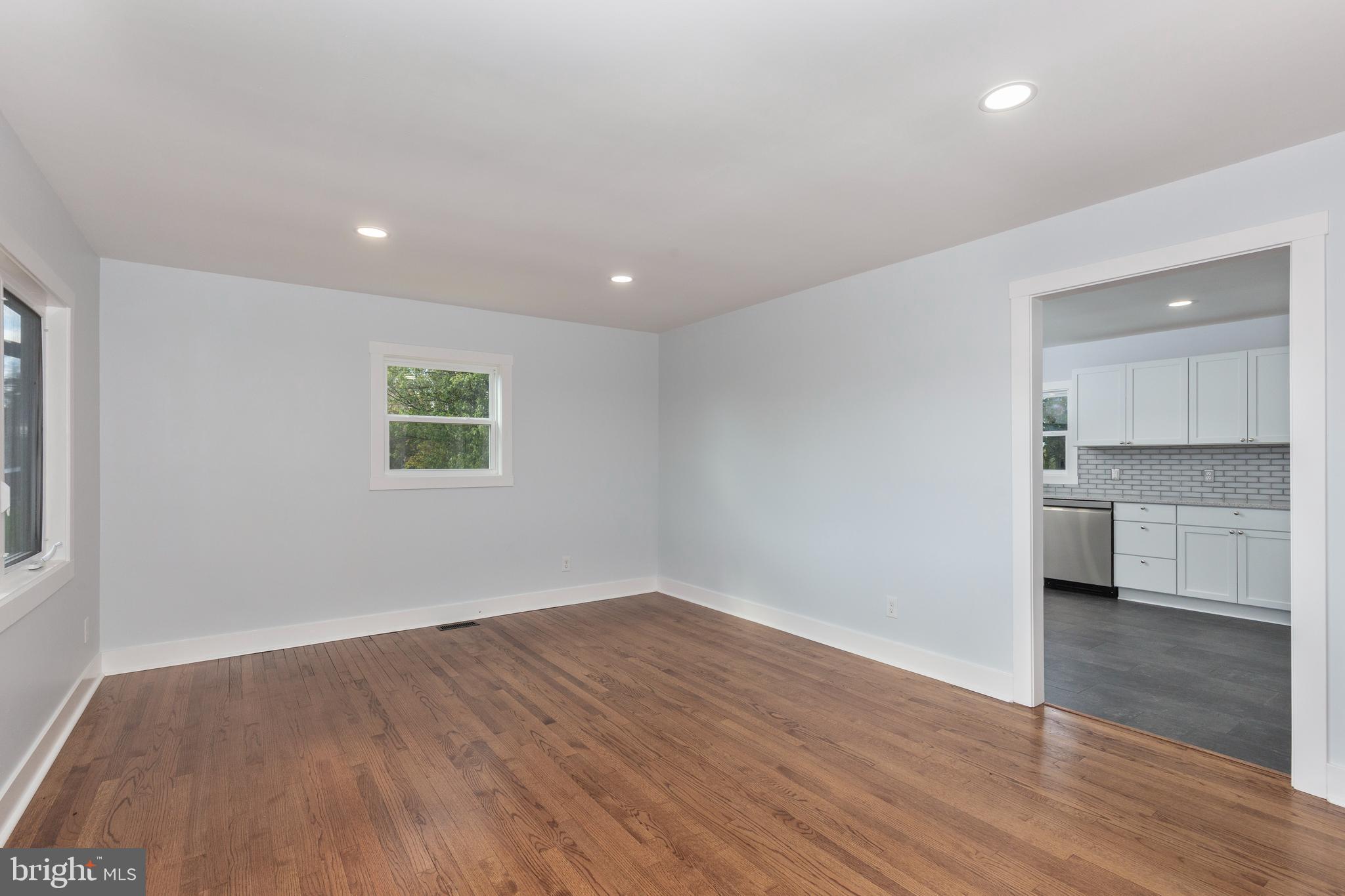 1030 Mckinstrys Mill Road Union Bridge, MD 21791 - Photo 6 of 43 wooden floor in an empty room with a window