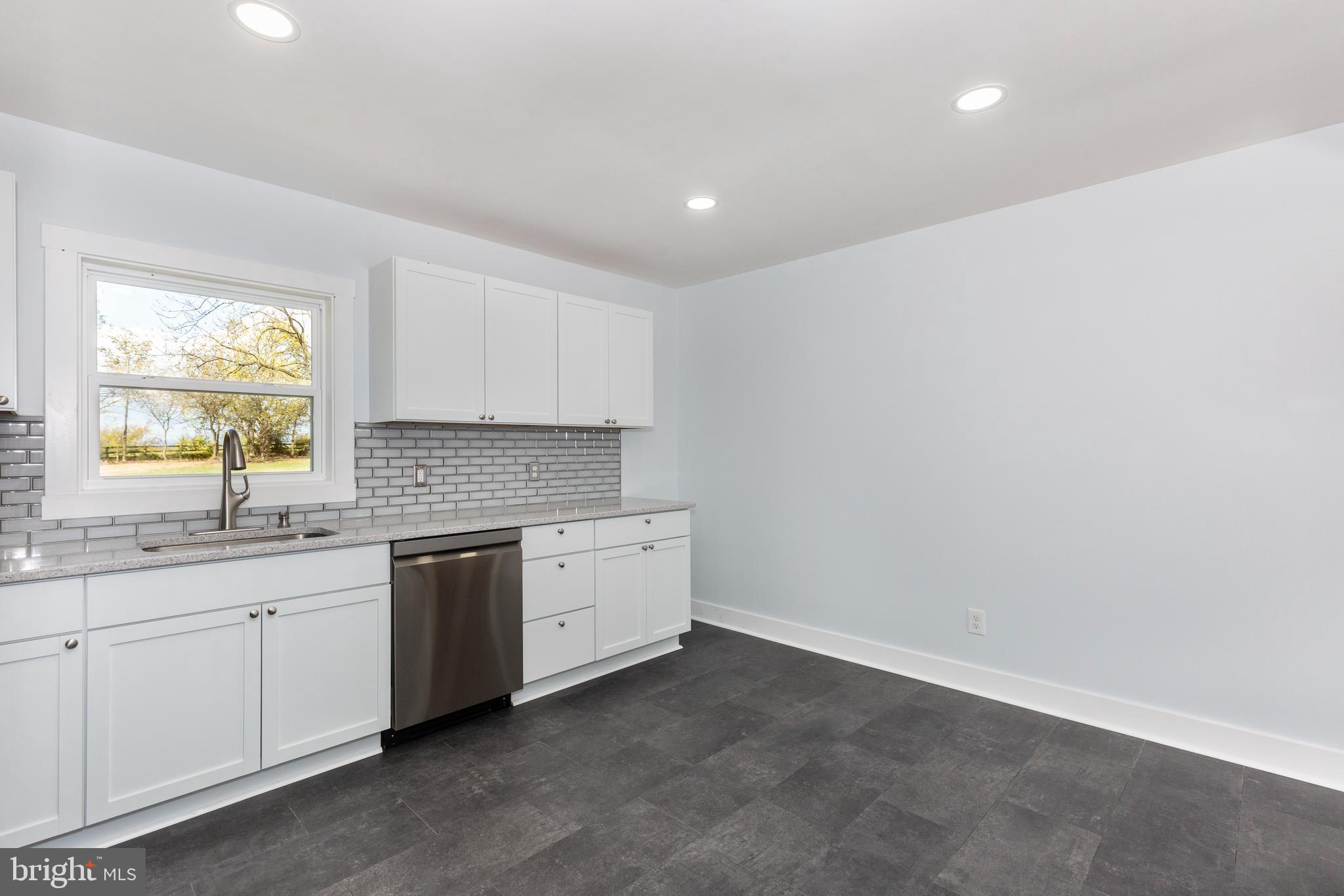 1030 Mckinstrys Mill Road Union Bridge, MD 21791 - Photo 10 of 43 a kitchen with sink and cabinets