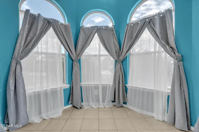 a view of a house with brick walls and windows