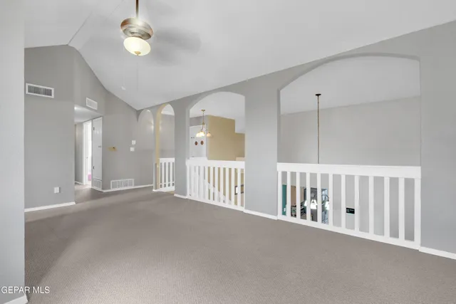 a view of a hallway with an entryway